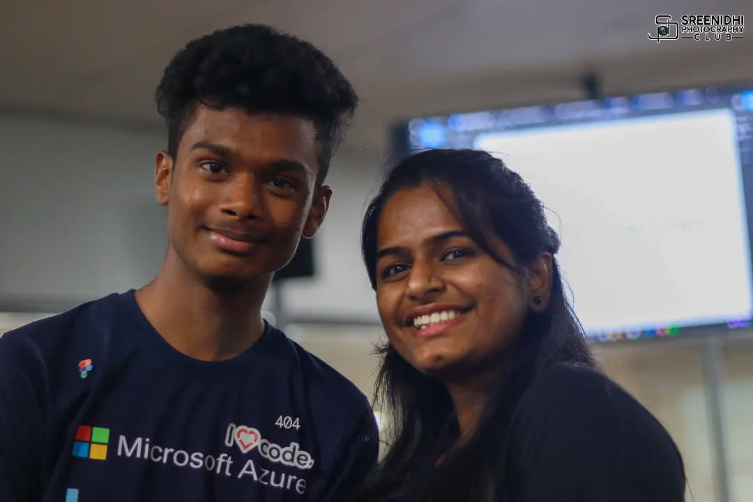 Community event candid with laptop stickers